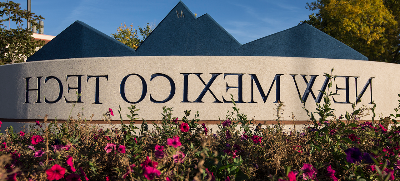 Image of the New Mexico Tech sign at the Bureau of Geology pong.